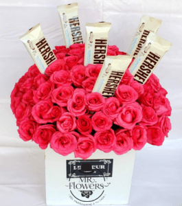 Arreglo con 75 Rosas y Hersheys Blancos