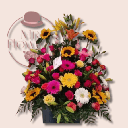 Arreglo Floral Primaveral en Canasta - Image 1